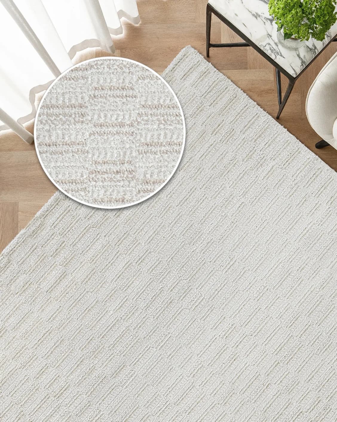 Henry Dune carpet in beige, shown in a lifestyle top view as image 9