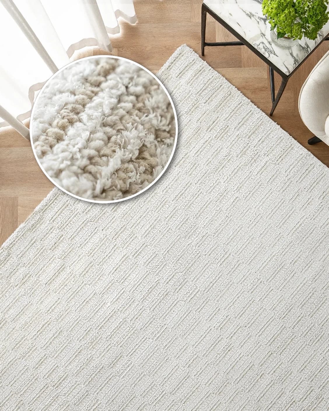 Henry Dune carpet in beige, shown in a lifestyle top view as image 2