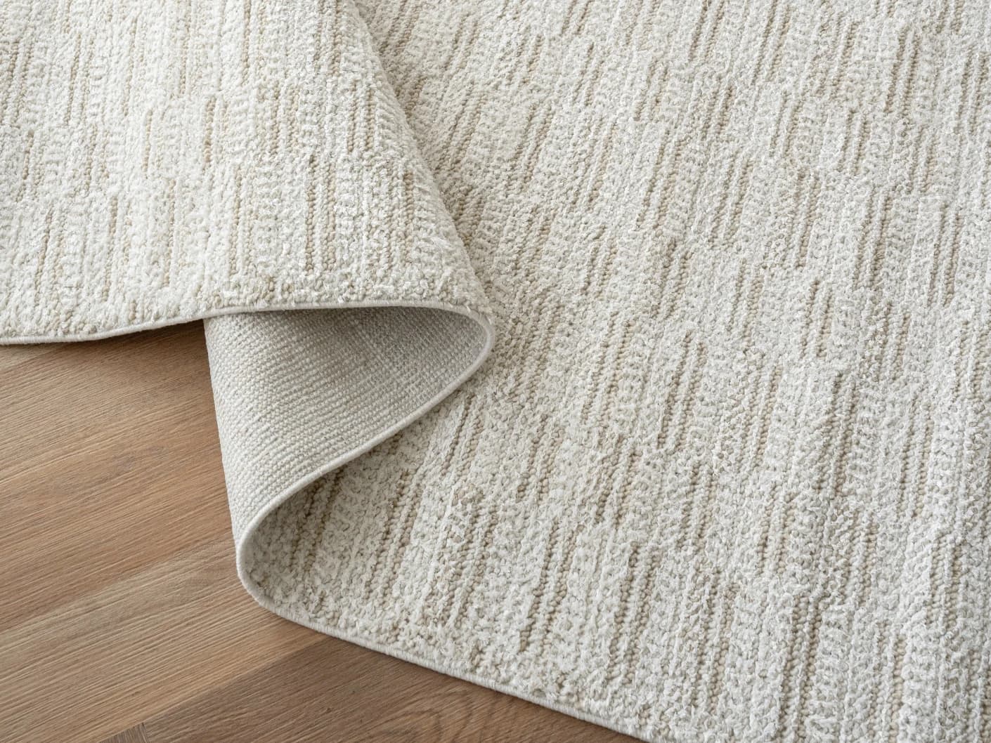 Henry Dune carpets in dune and beige, shown in a product close-up view
