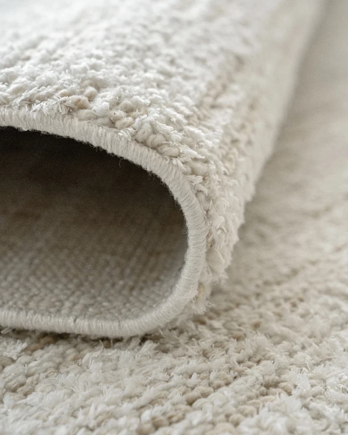 Henry Dune carpet in beige, shown in a product close-up as image 12