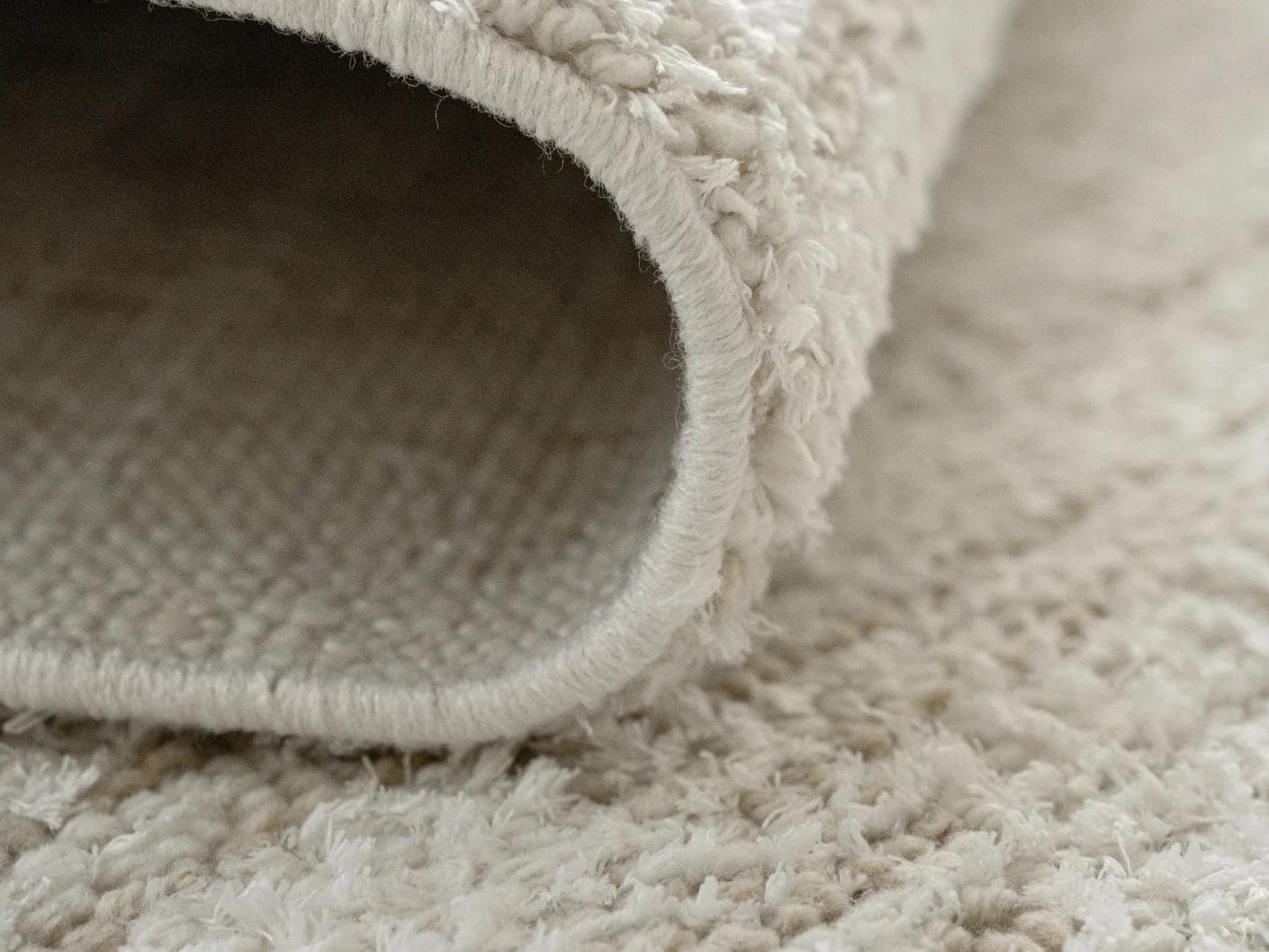 Henry Dune carpet in beige, shown in a product close-up as image 12