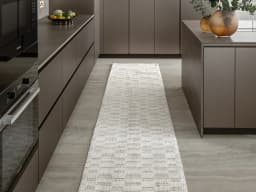 Henry Dune Runners carpet in beige, shown in a lifestyle front view