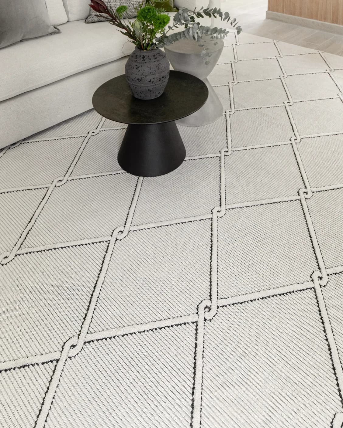 Henry Dusty carpet in ivory and charcoal, shown in a lifestyle close-up as image 5