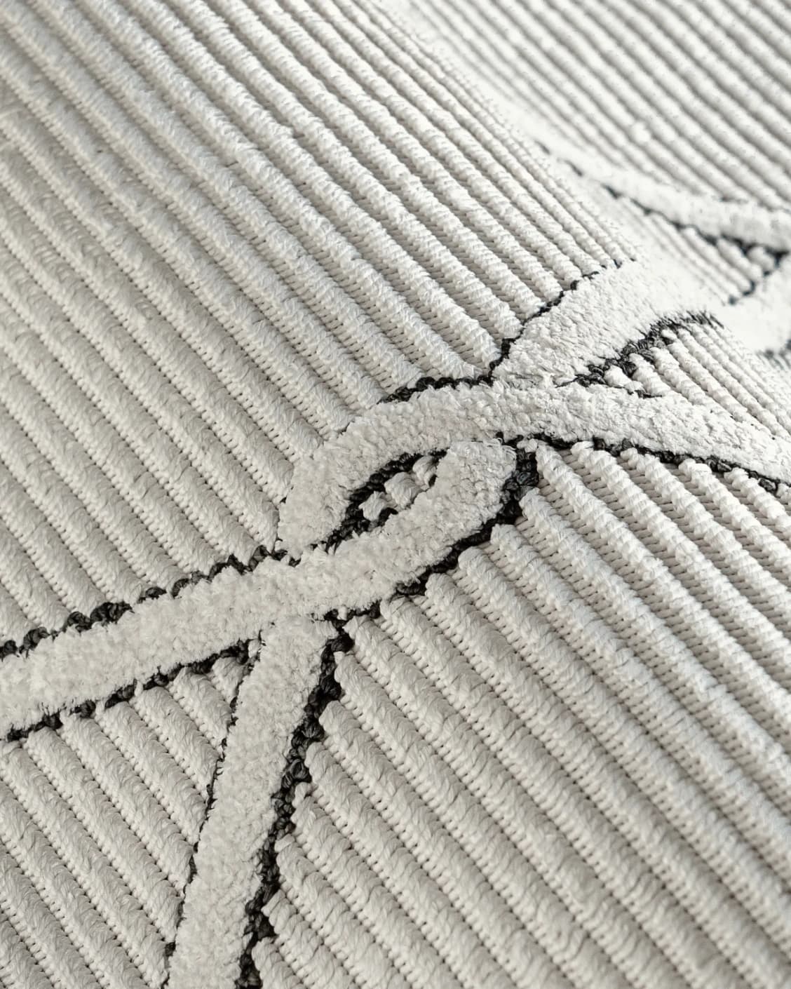 Henry Dusty carpet in ivory and charcoal, shown in a product close-up as image 9