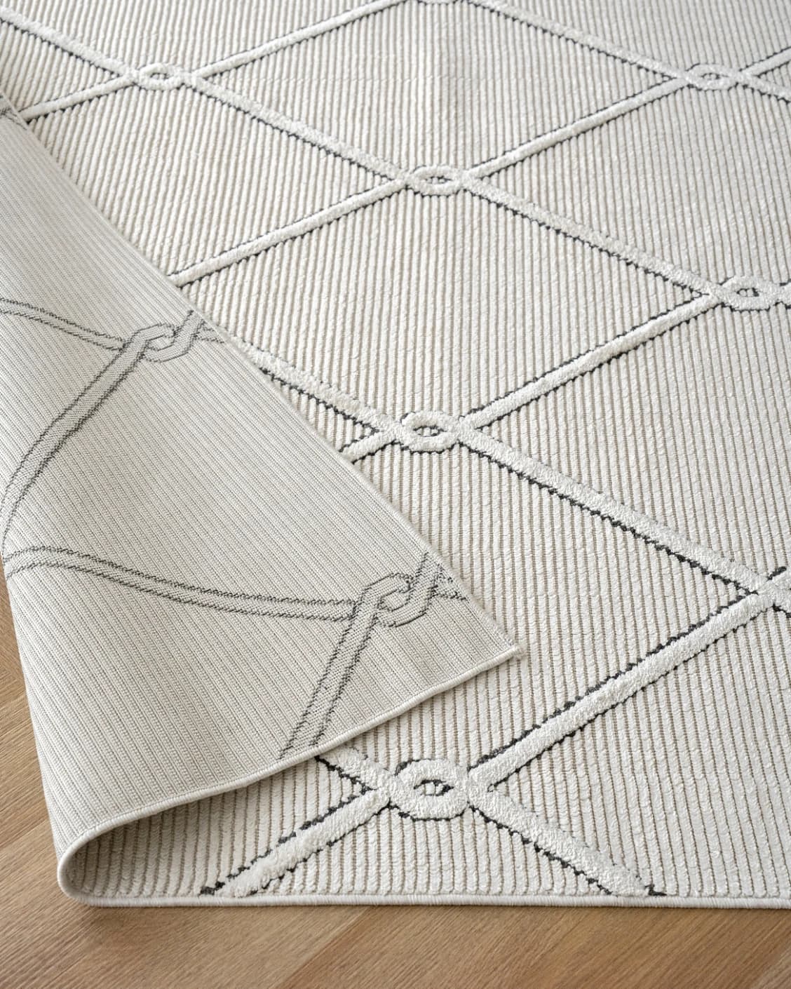 Henry Dusty carpet in ivory and charcoal, shown in a product close-up as image 10