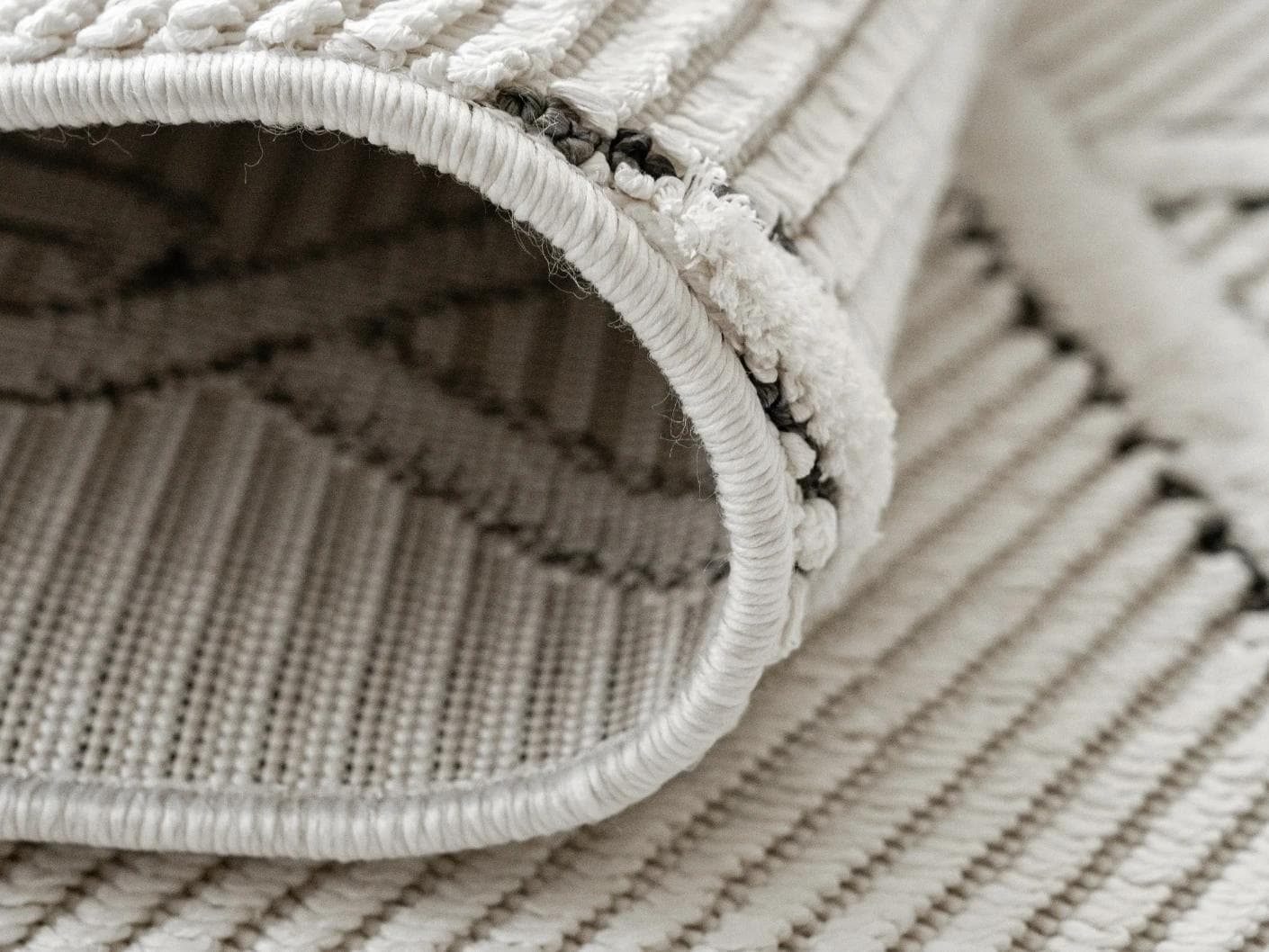 Henry Dusty carpet in ivory and charcoal, shown in a product close-up as image 12