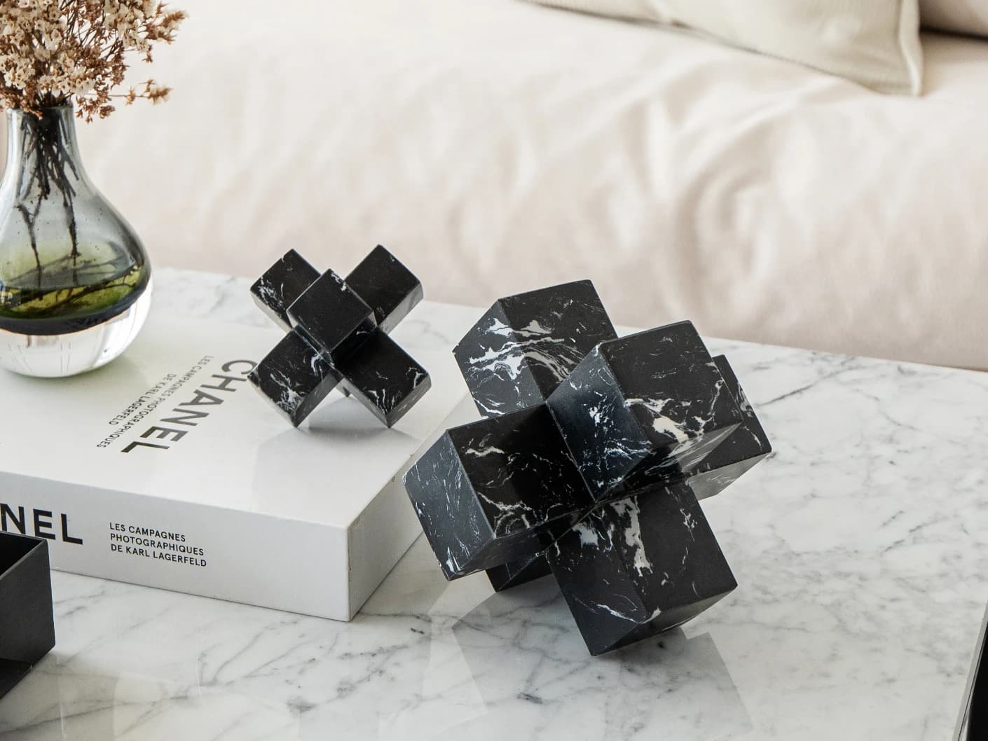 Herman Ellis statues and sculptures in black, shown in a lifestyle front view
