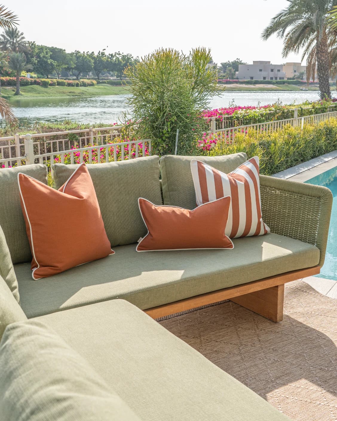 Hisao Bundle cushion in rust, shown in a lifestyle left view as image 2