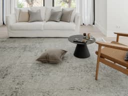Jacob Alba carpet in grey, shown in a lifestyle front view