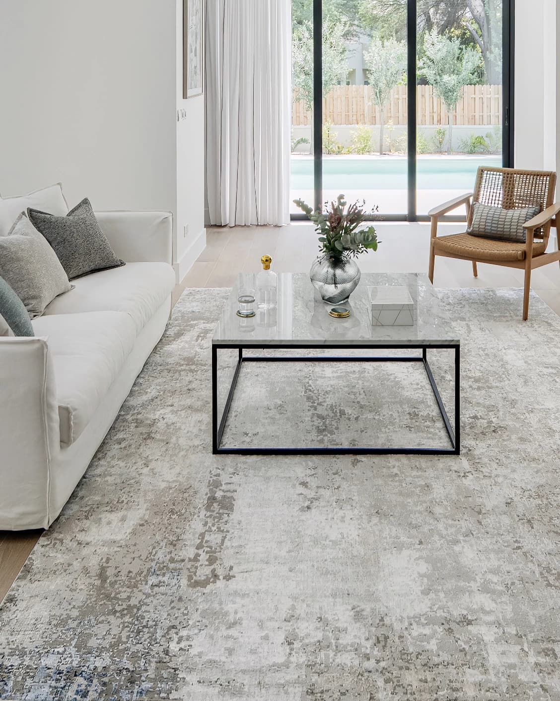 Jacob Azure carpet in grey and blue, shown in a lifestyle front view as image 4