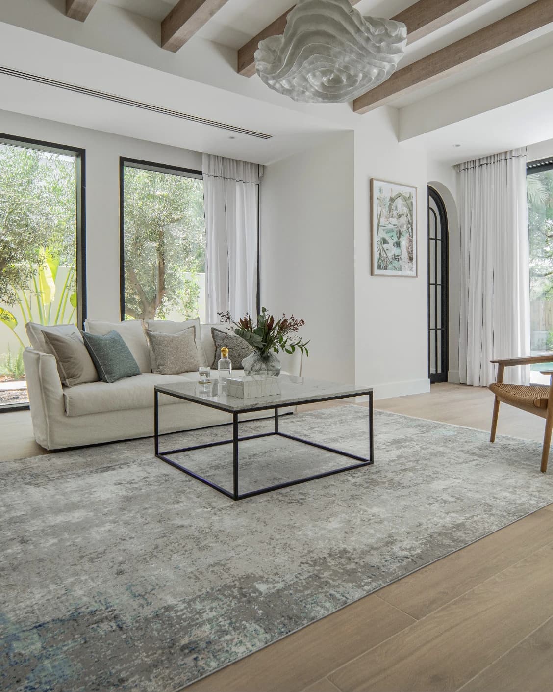 Jacob Azure carpet in grey and blue, shown in a lifestyle left view as image 6