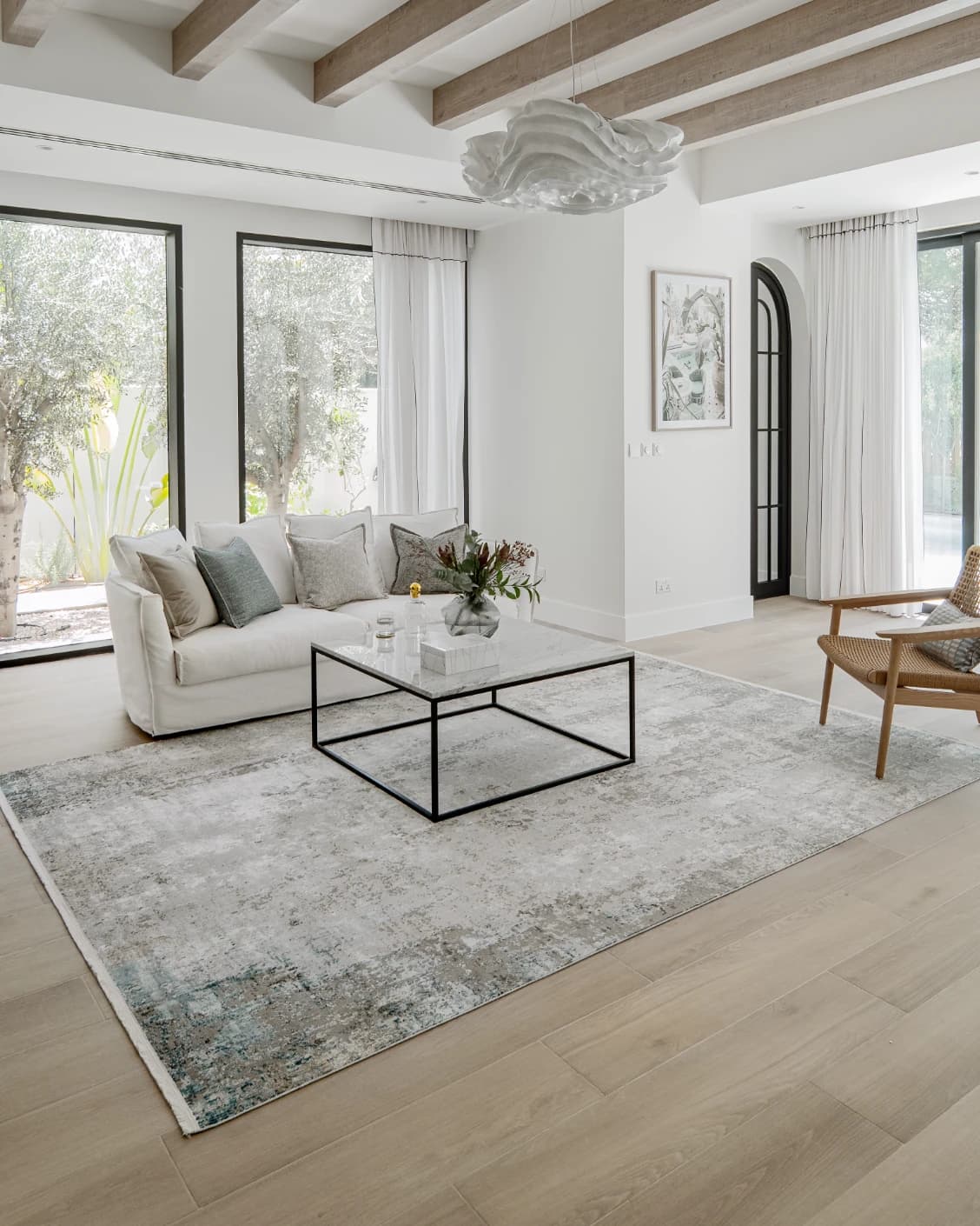 Jacob Azure carpet in grey and blue, shown in a lifestyle left view as image 7