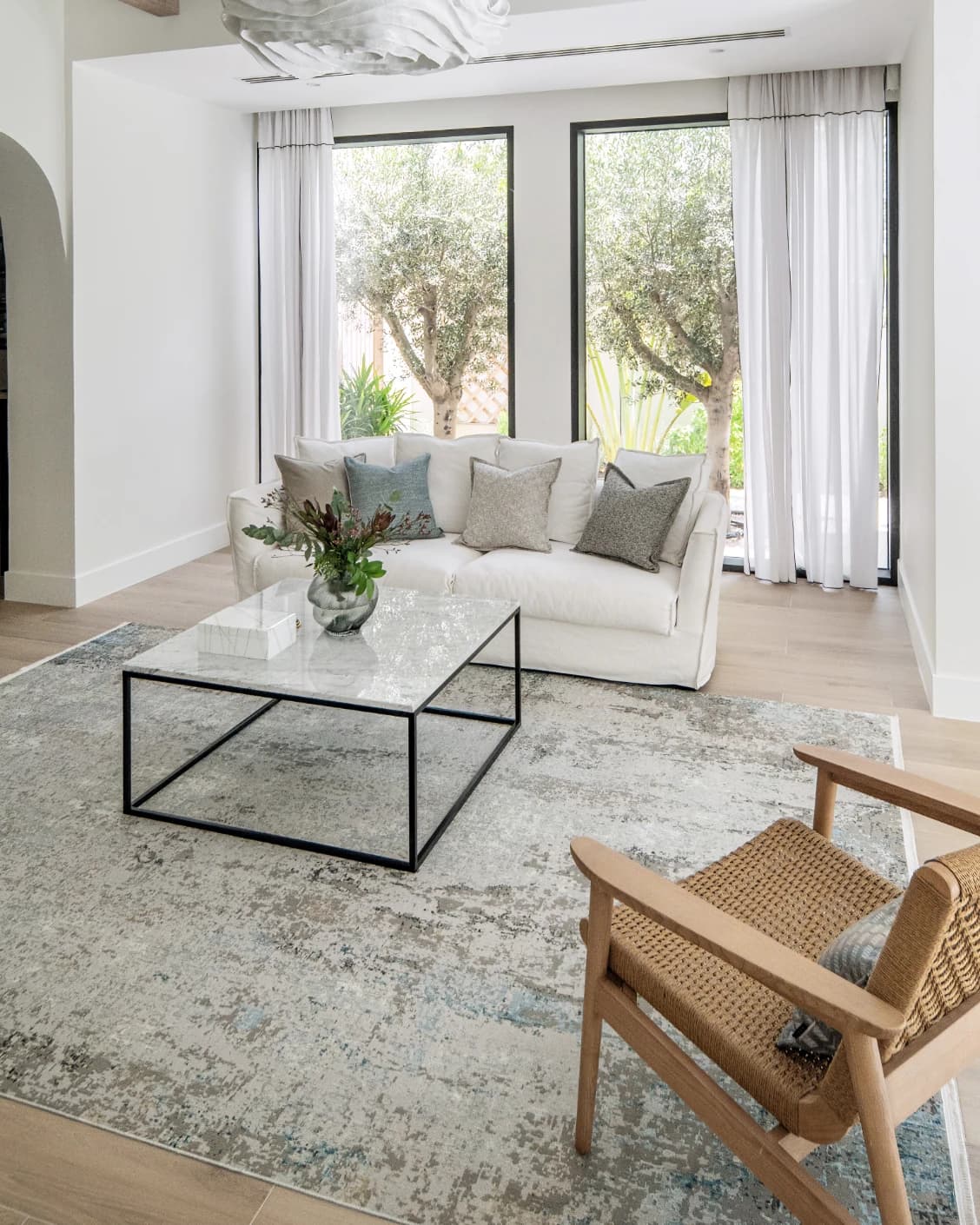 Jacob Azure carpet in grey and blue, shown in a lifestyle right view as image 8