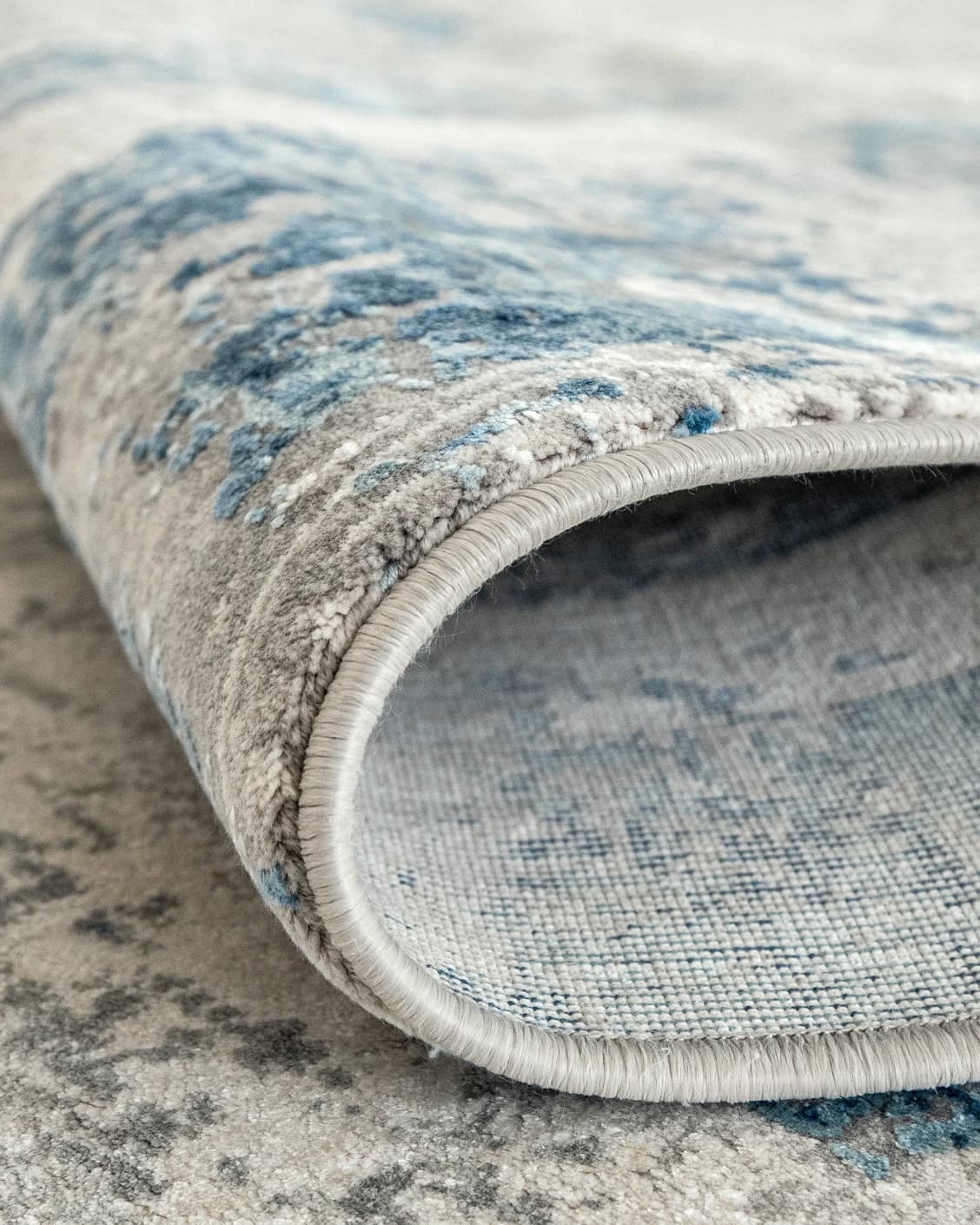 Jacob Azure carpet in grey and blue, shown in a product close-up as image 11