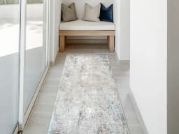 Jacob Azure Runners carpet in grey and blue, shown in a lifestyle front view