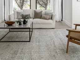 Jacob Sandy carpet in sandy, rust and grey, shown in a lifestyle front view