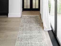 Jacob Sandy Runners carpet in sandy, rust and grey, shown in a lifestyle front view