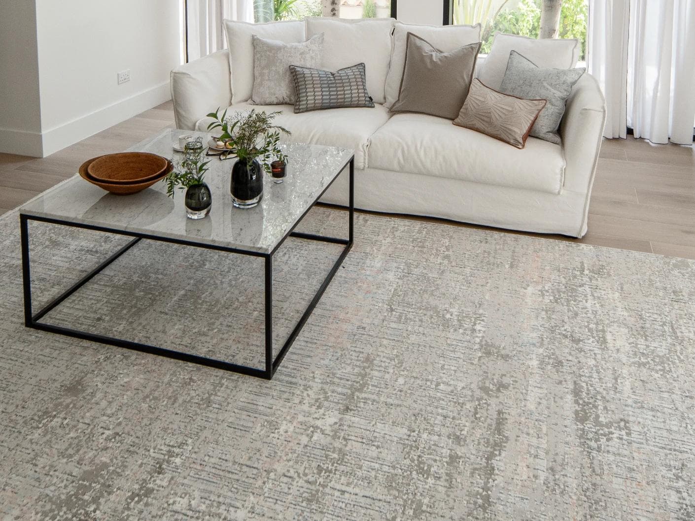 Jacob Sandy carpet in rust and grey, shown in a lifestyle close-up as image 4