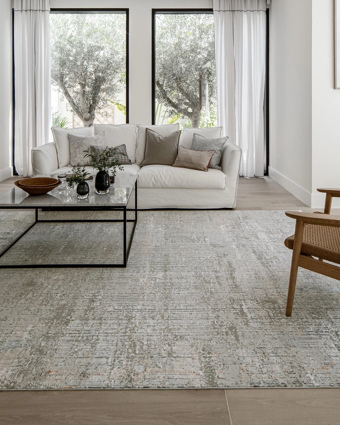Jacob Sandy carpet in rust and grey, shown in a lifestyle front view as image 5