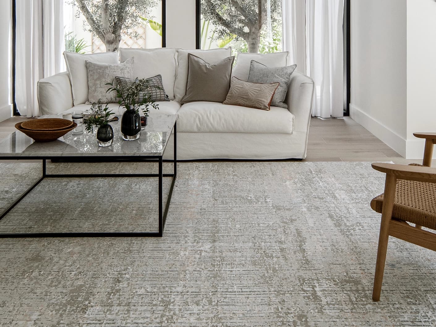 Jacob Sandy carpet in rust and grey, shown in a lifestyle front view as image 5