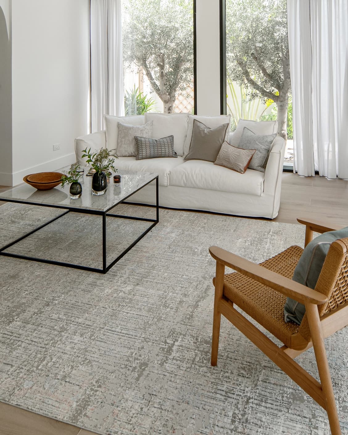 Jacob Sandy carpet in rust and grey, shown in a lifestyle right view as image 9