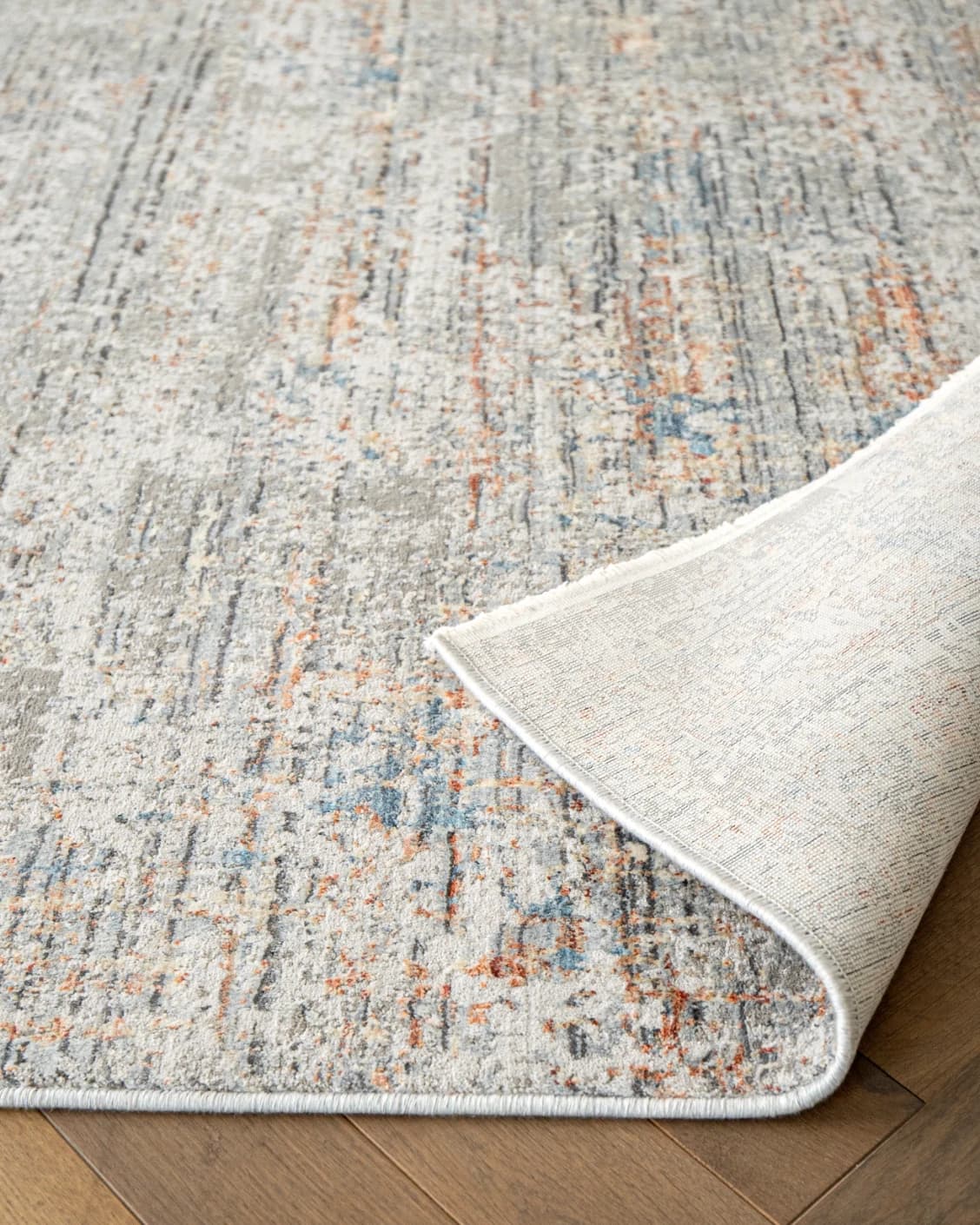 Jacob Sandy carpet in rust and grey, shown in a product close-up as image 13