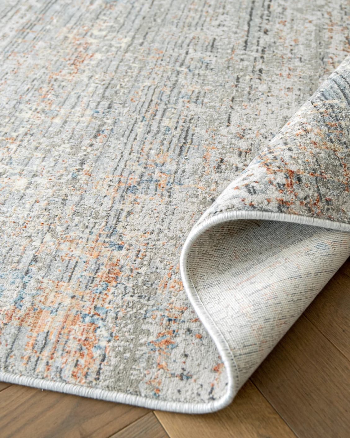 Jacob Sandy carpet in rust and grey, shown in a product close-up as image 14