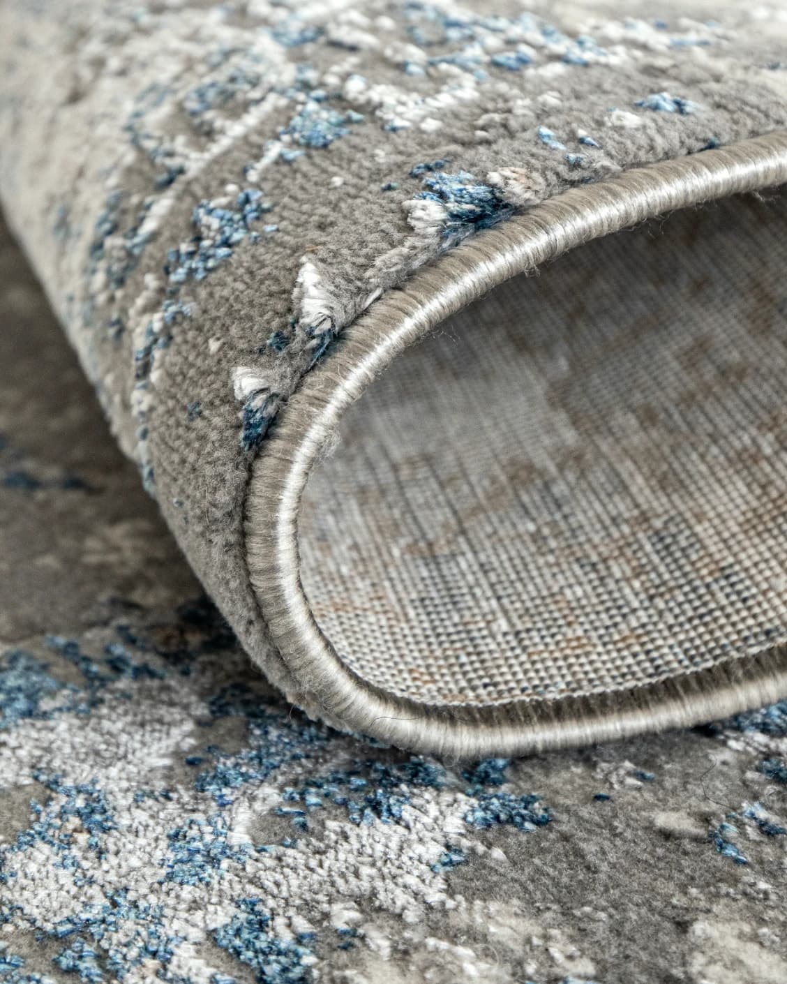 Jacob Sky carpet in blue and grey, shown in a product close-up as image 8