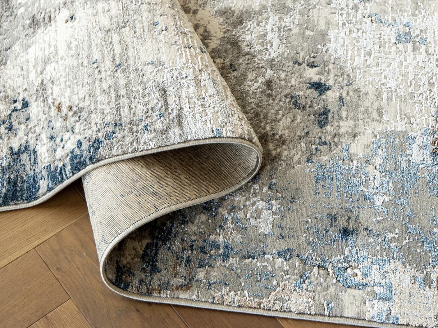 Jacob Sky carpets in sky, blue and grey, shown in a product close-up view