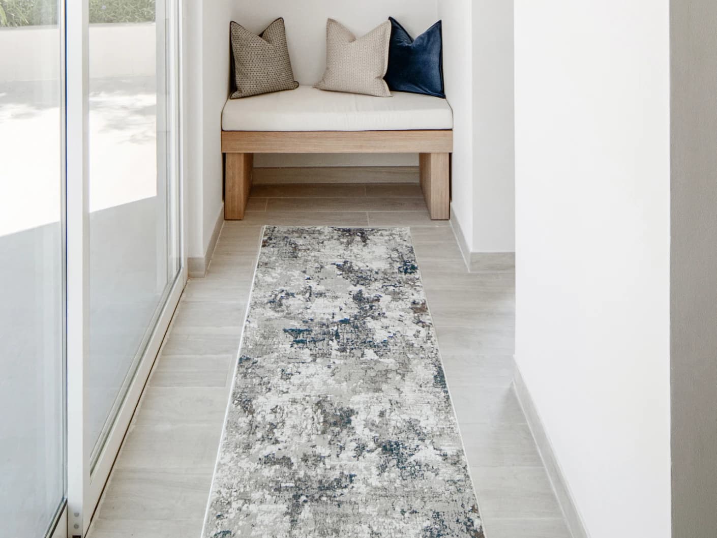 Jacob Sky Runners carpet in blue and grey, shown in a lifestyle front view
