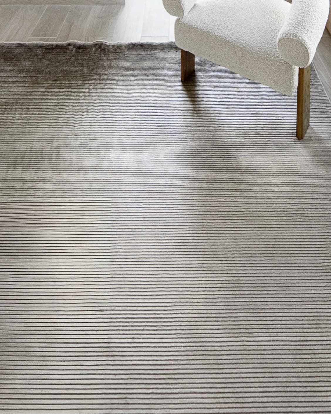 Jade Ashton carpet in grey, shown in a lifestyle top view as image 7