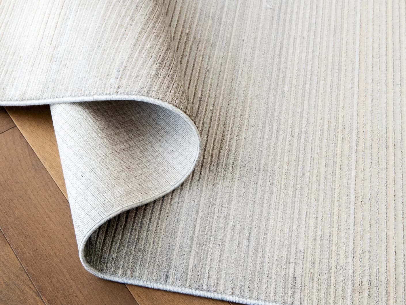 Jade Ashton carpets in grey, shown in a product close-up view