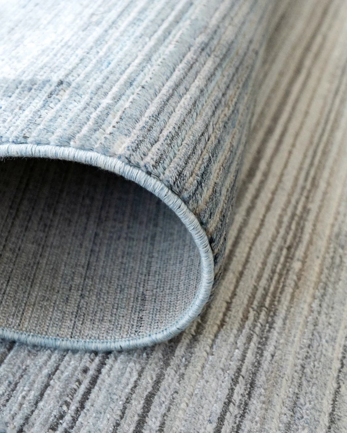 Jade Sky carpet in blue, shown in a product close-up as image 7