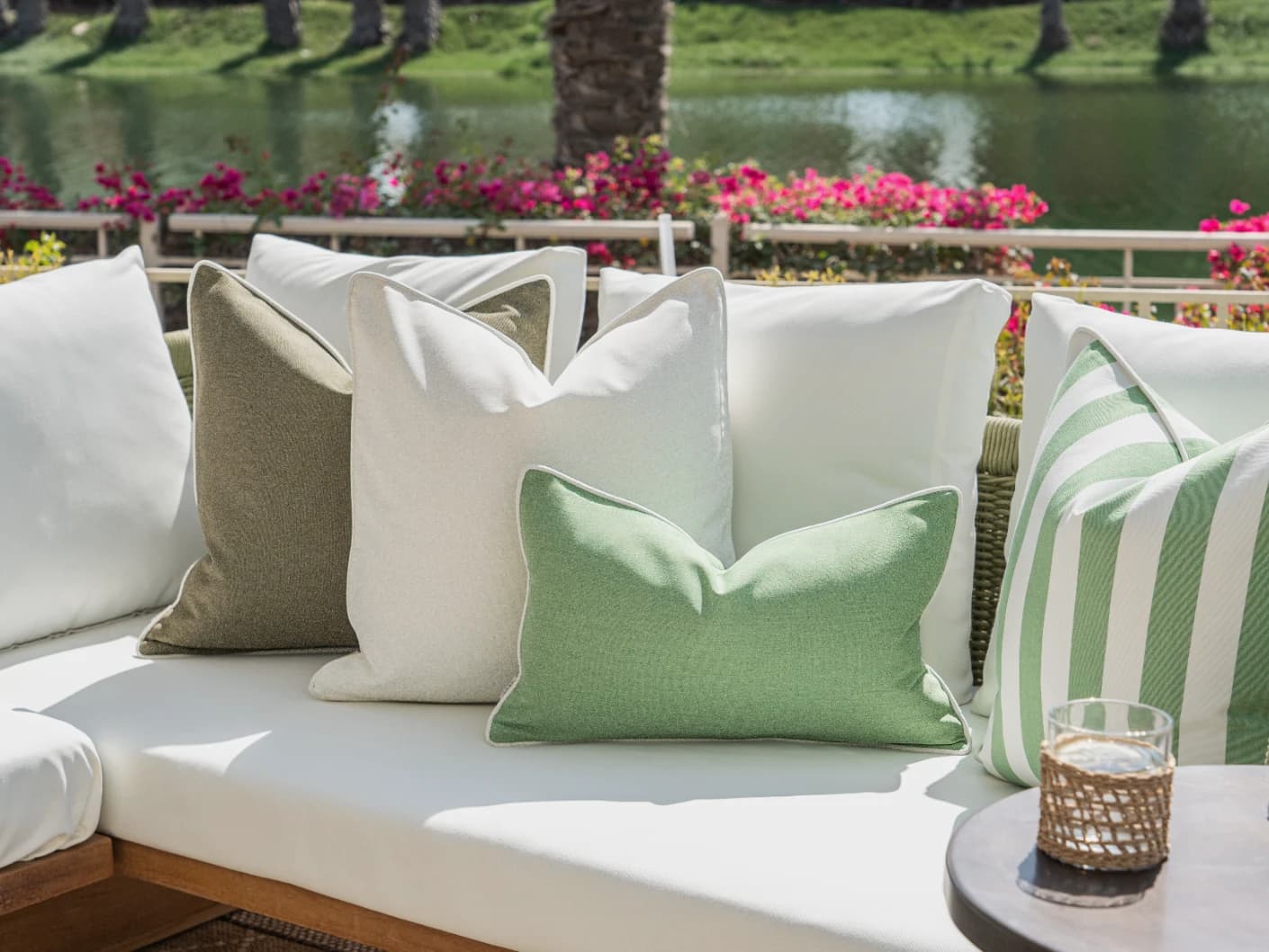 Jalena Bundle bundle cushions in green and ivory, shown in a lifestyle front view