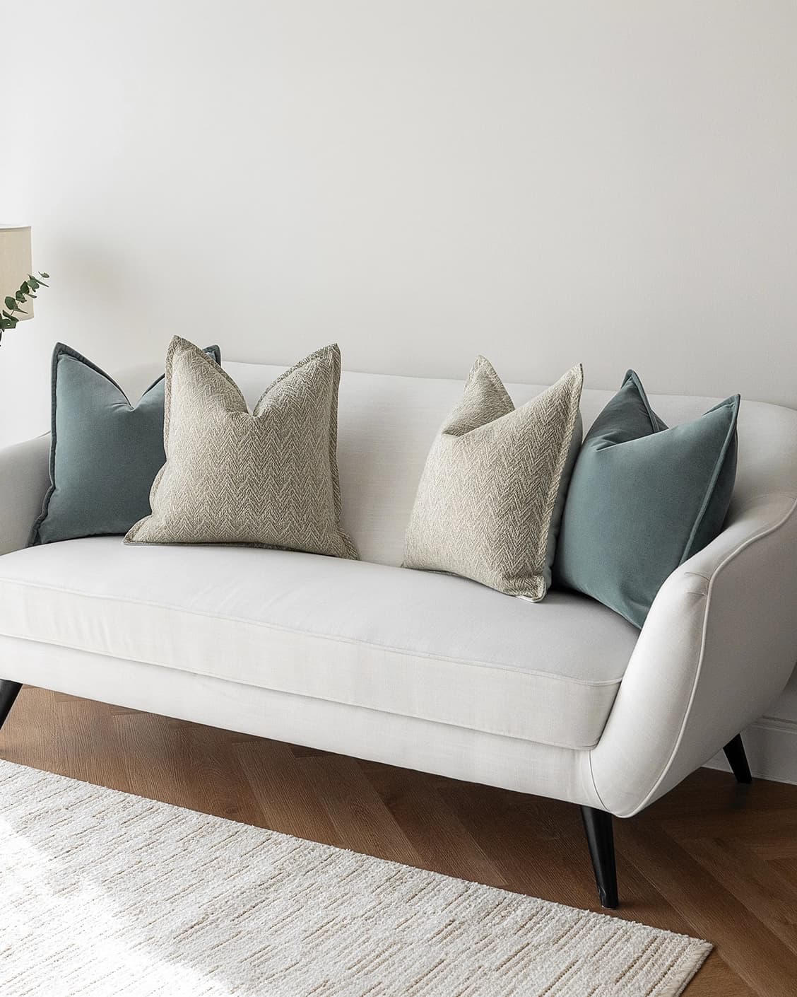 Jastine Bundle cushion in blue and beige, shown in a lifestyle right view as image 2