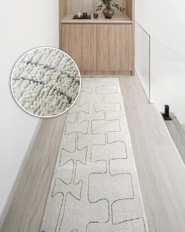 Jaxon Bianca Runners carpet in ivory and charcoal, shown in a lifestyle front view