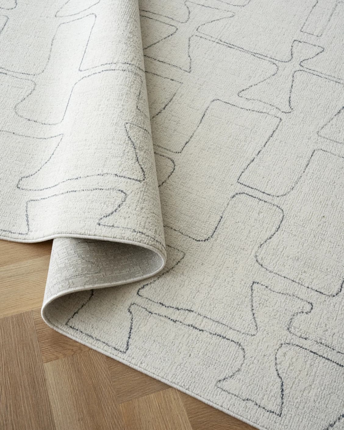 Jaxon Bianca carpet in ivory and charcoal, shown in a lifestyle close-up as image 4