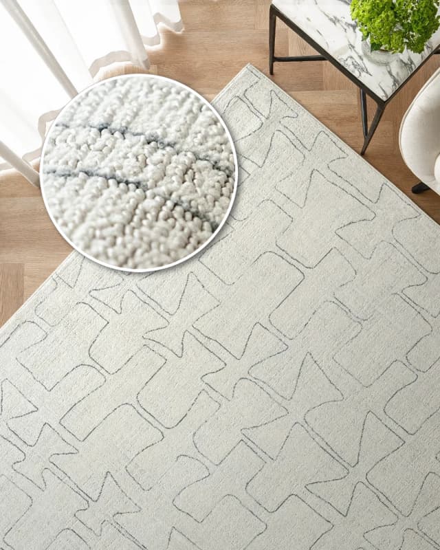 Jaxon Bianca carpet in ivory and charcoal, shown in a lifestyle top view as image 2