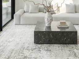 Jay Ashton carpet in grey, shown in a lifestyle front view