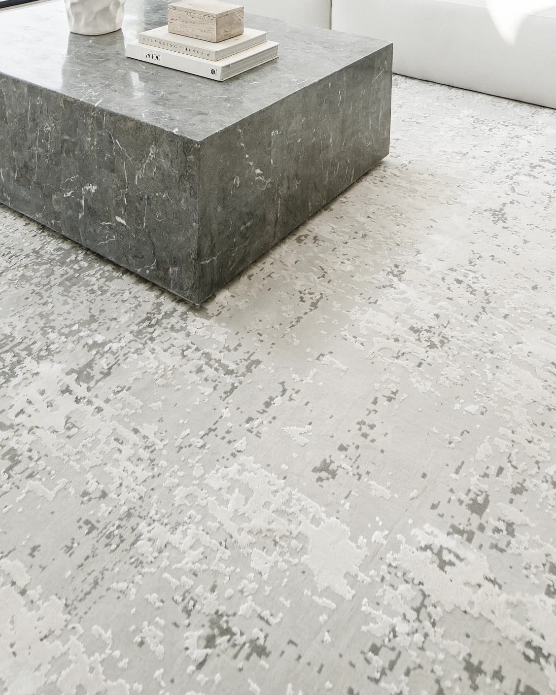 Jay Ashton carpet in grey, shown in a lifestyle close-up as image 9