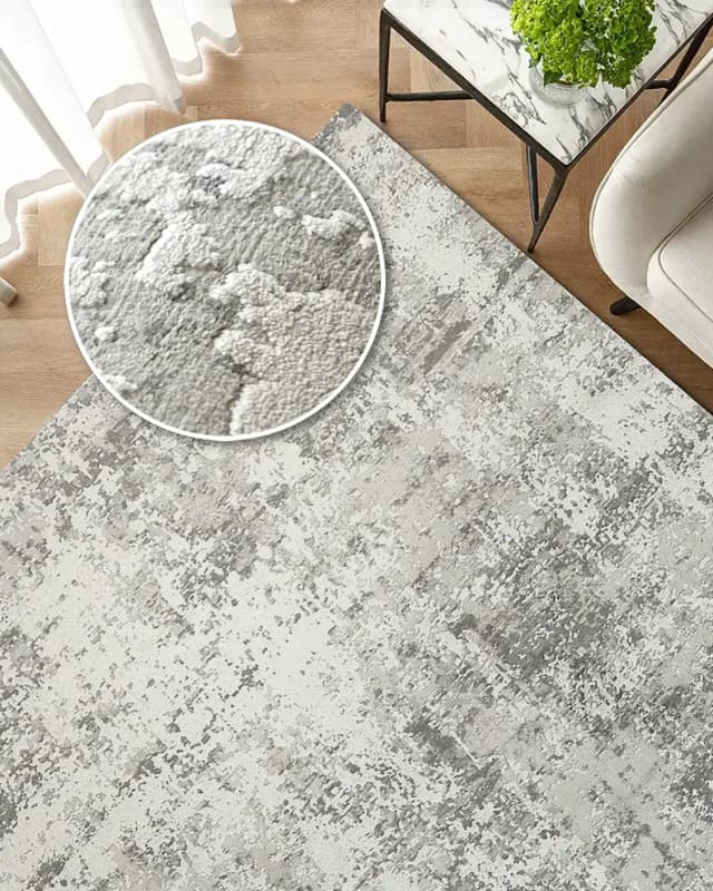 Jay Ashton carpet in grey, shown in a lifestyle top view as image 2