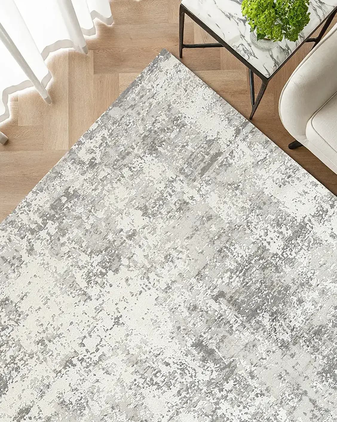 Jay Ashton carpet in grey, shown in a lifestyle top view as image 2