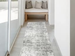Jay Ashton Runners carpet in grey, shown in a lifestyle front view
