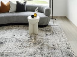 Jay Haywoods carpet in grey, shown in a lifestyle front view