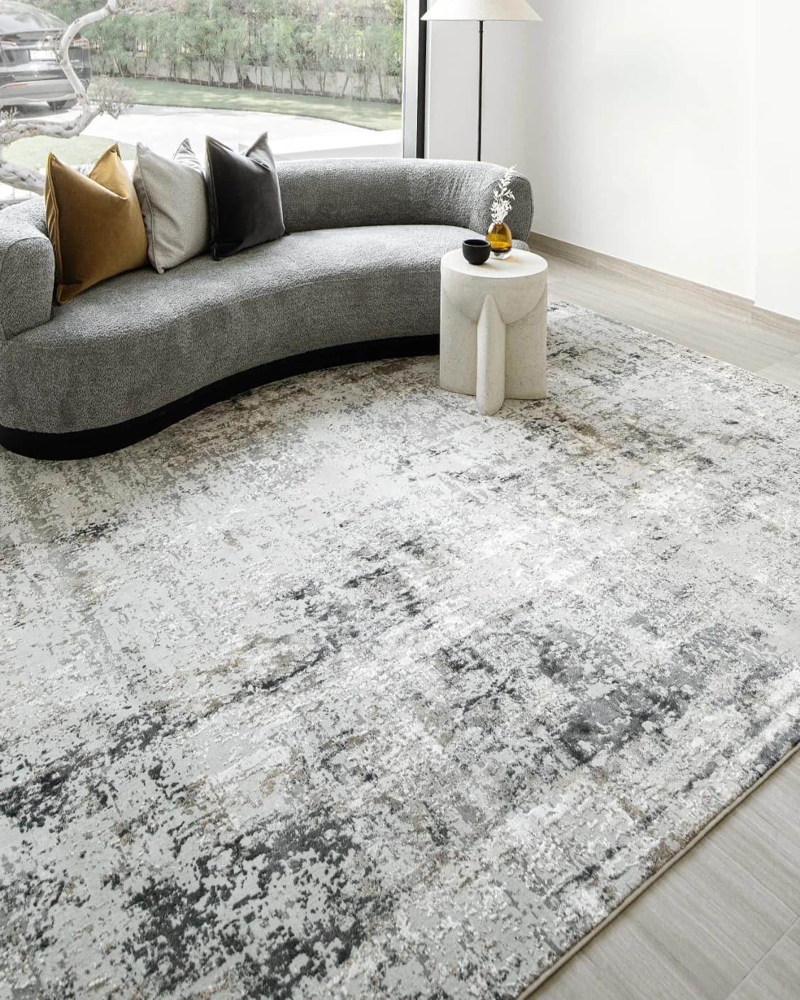 Jay Haywoods carpet in grey, shown in a lifestyle left view as image 5