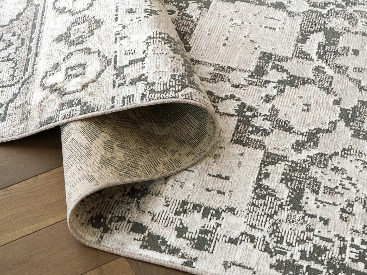Jerik Ashton carpets in grey, shown in a product close-up view