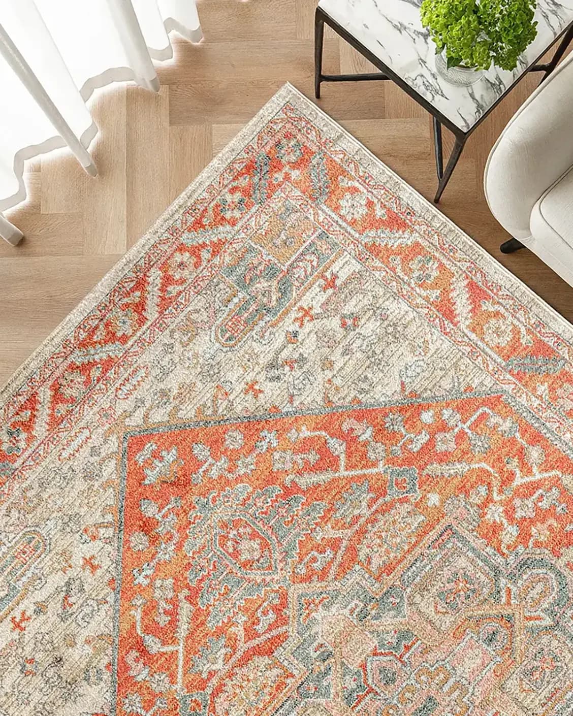 Julian Copper carpet in red and beige, shown in a lifestyle top view as image 2