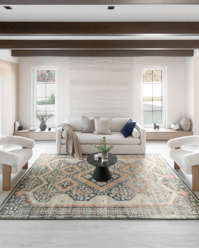 Julian Navy carpets in beige, blue and multicolour, shown in a lifestyle front view as image 4