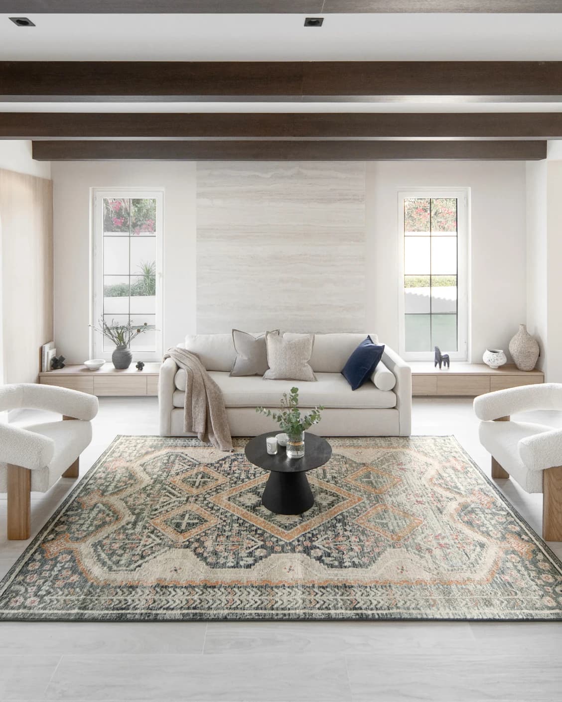 Julian Navy carpets in beige, blue and multicolour, shown in a lifestyle front view as image 4