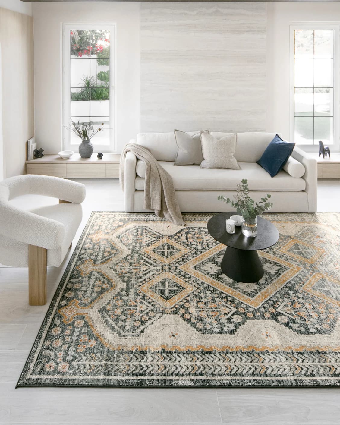 Julian Navy carpets in beige, blue and multicolour, shown in a lifestyle front view as image 3